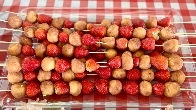Strawberry shortcake donut skewers on plate