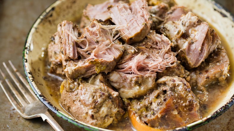 bowl of carnitas and fork
