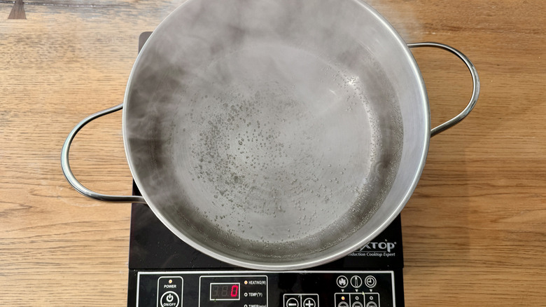Boiling water in a pot