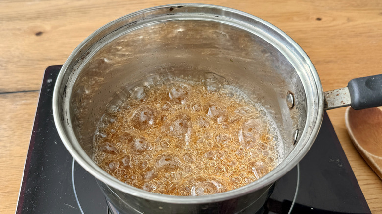 Caramel bubbling in saucepan