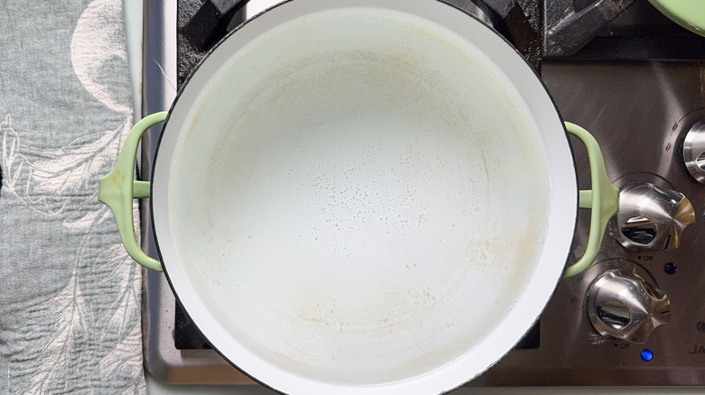 Pot of water heating on stovetop