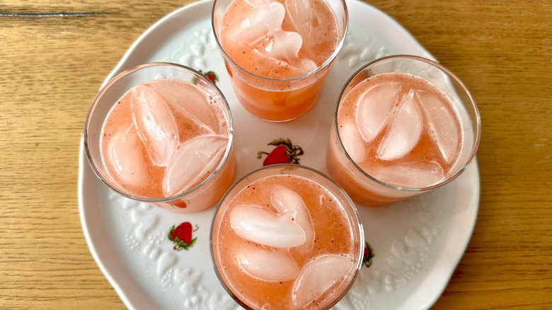 pink lemonade in ice-filled glasses