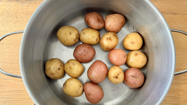 Drained cooked potatoes