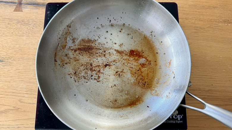 heating beef drippings in skillet