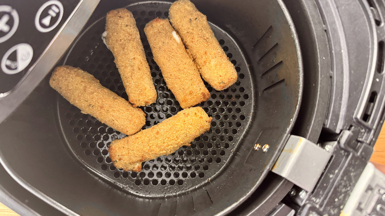 breaded cheese sticks in an air fryer
