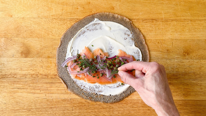Buckwheat crepe with creme fraiche, smoked salmon, red onion, capers, chives and dill fronds