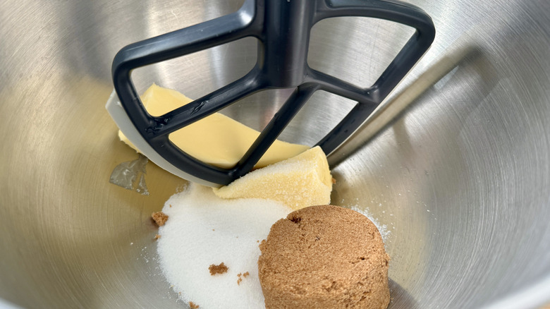 Butter and sugars in mixing bowl