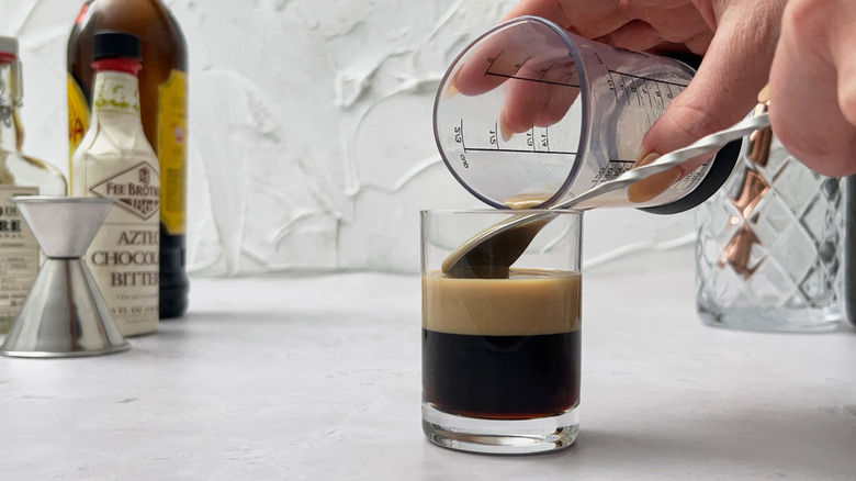 pouring cream over spoon