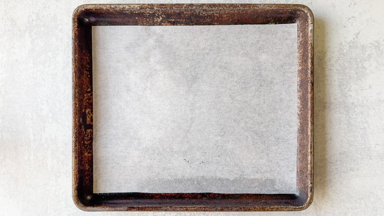 Baking sheet lined with parchment paper