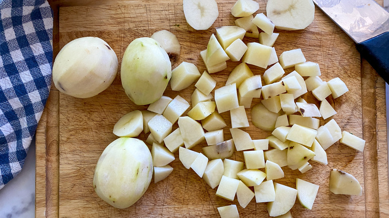 chopped potatoes on board