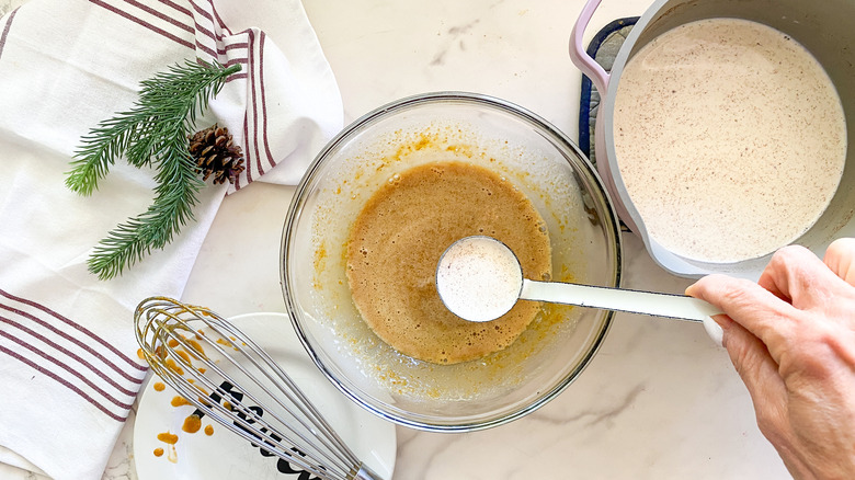 ladle of milk mixture