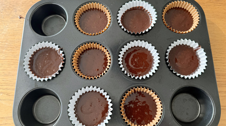 Cupcake batter in liners in pan