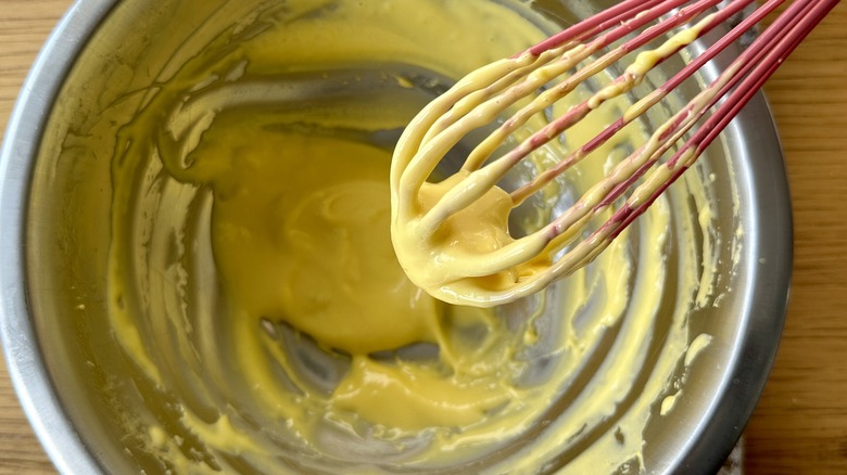Whisking oil into egg yolks