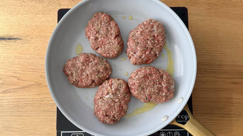 Cooking Salisbury steaks in skillet