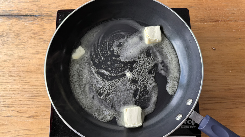 butter melting in skillet