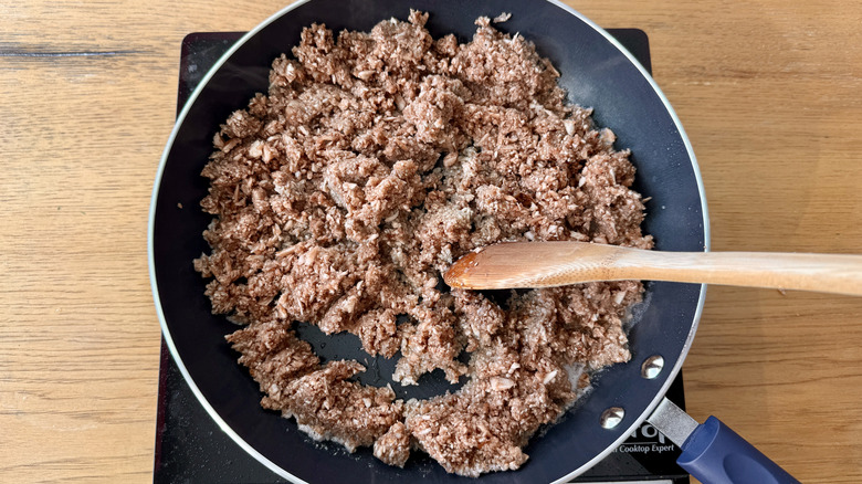 sauteeing pulsed mushrooms in skillet