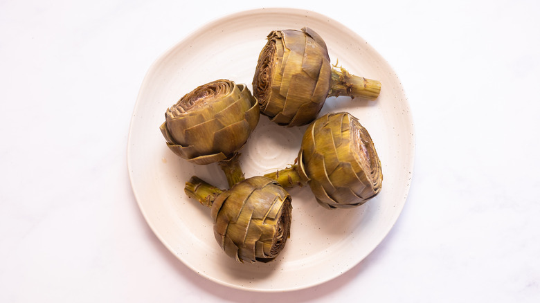 steamed artichokes on plate
