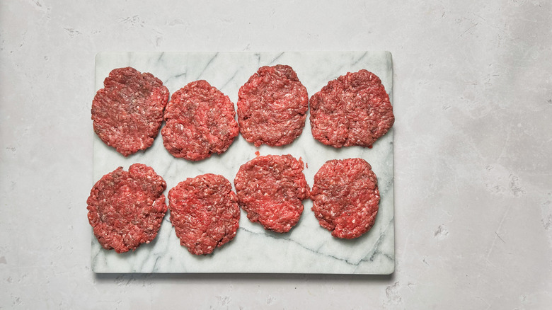 8 patties on a table