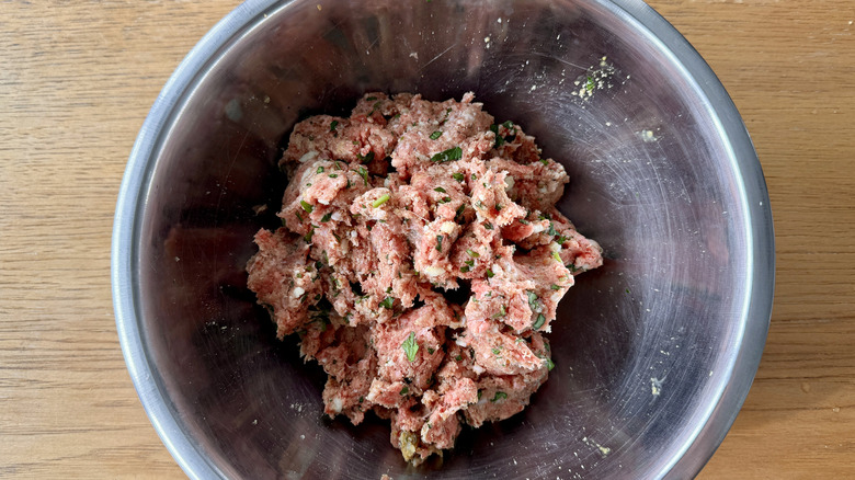 ground meat in metal bowl
