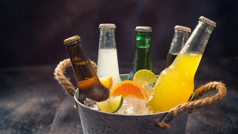 Beer and other drinks in ice bucket