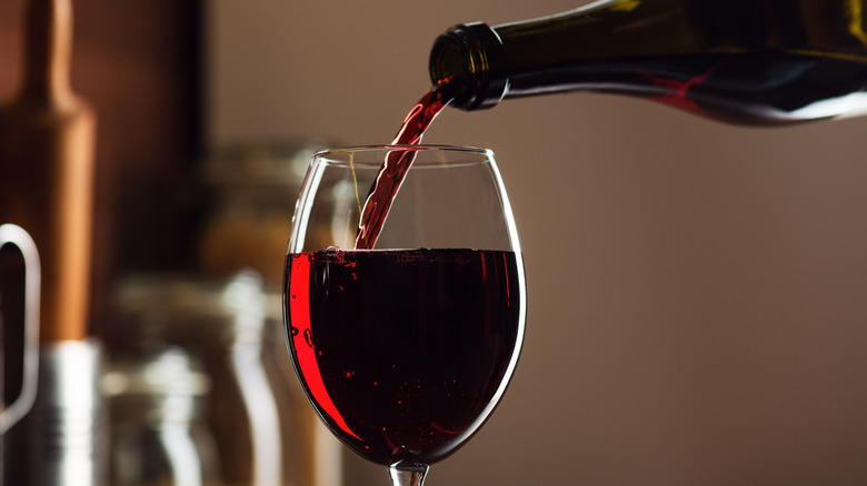 Pouring red wine