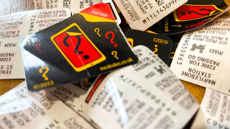 A pile of McDonald's Monopoly stickers.