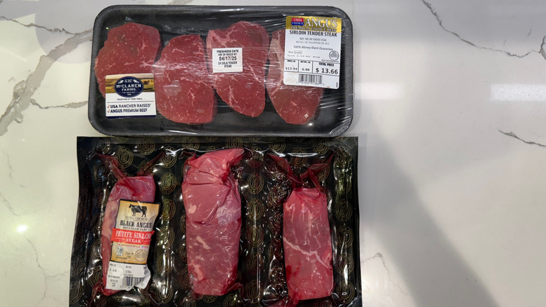 two packages of sirloin steak