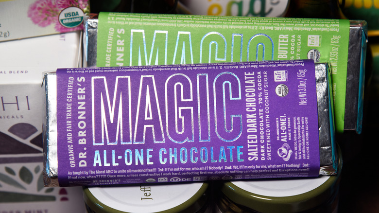 Two Dr. Bronner's Magic All-One chocolate bars on display.