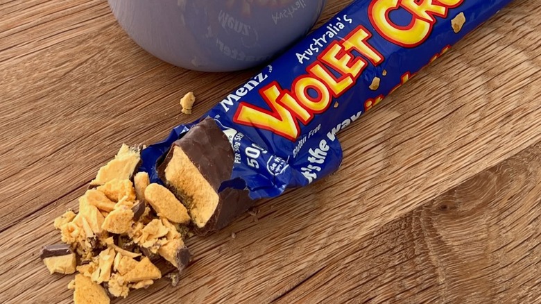 A Violet Crumble candy bar broken into chunks on a table
