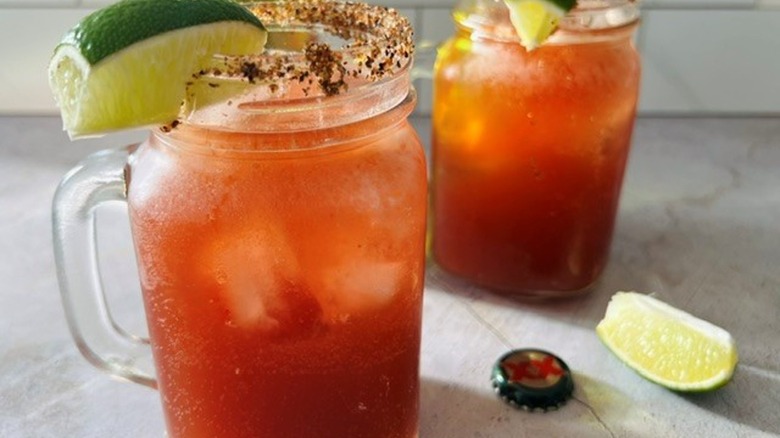 micheladas with lime wedges