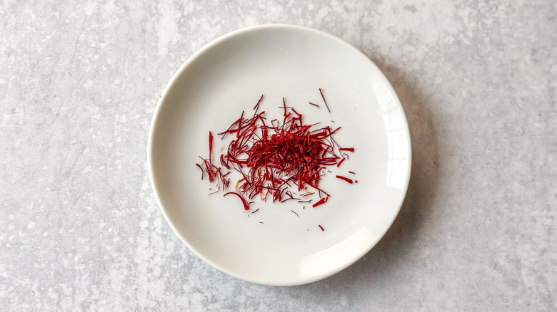 Saffron threads on white plate