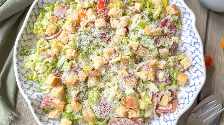 Italian deli grinder salad in serving bowl close up