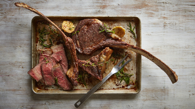A medium rare tomahawk steak