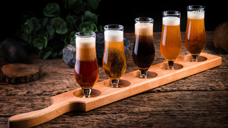 Flight of beer on wooden tray