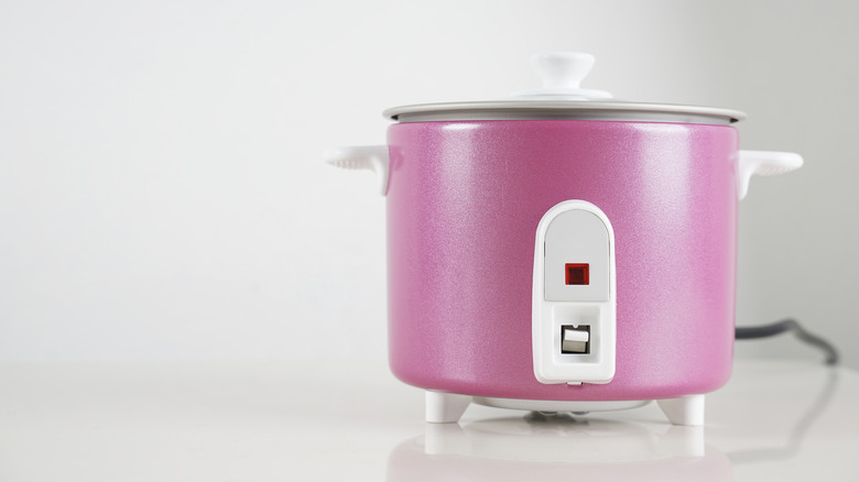 A pink rice cooker.